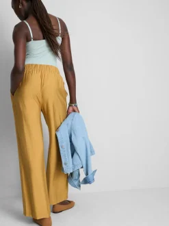 Pantalones palazzo con detalle de lazo