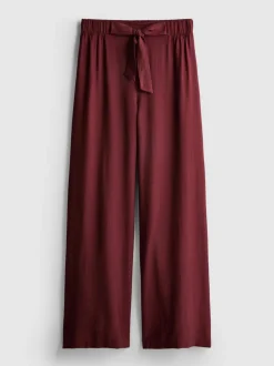 Pantalones palazzo con detalle de lazo