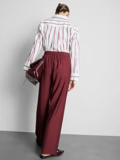 Pantalones palazzo con detalle de lazo