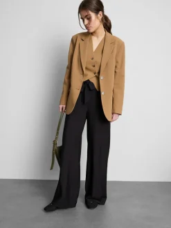 Pantalones palazzo con detalle de lazo