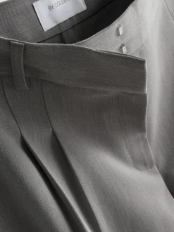 Pantalones plisados de pernera ancha By Coleen