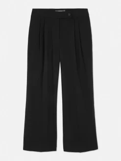 Pantalones plisados de talle medio
