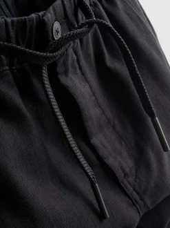 Pantalones texturizados con cordón de ajuste