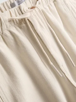 Pantalones texturizados con cordón de ajuste