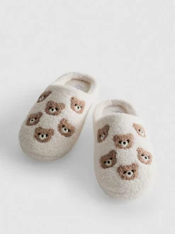 Pantuflas estilo chinela en piel de borrego sintética