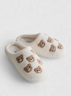 Pantuflas estilo chinela en piel de borrego sintética