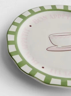 Plato de postre con estampado de cafetería