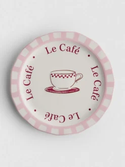 Plato de postre con estampado de cafetería
