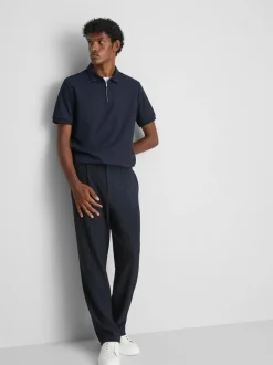 Polo con cremallera y textura de The Edit