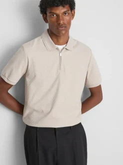 Polo con cremallera y textura de The Edit