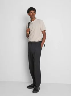 Polo con cremallera y textura de The Edit