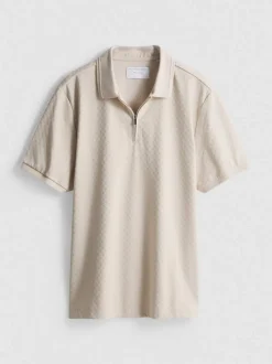 Polo con cremallera y textura de The Edit