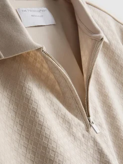 Polo con cremallera y textura de The Edit