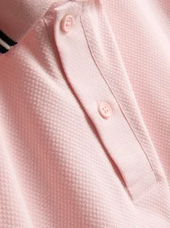 Polo con cuello y ribetes