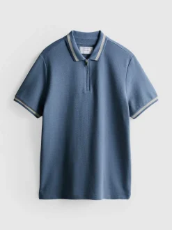 Polo con textura y cuello con cremallera