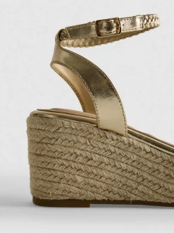 Sandalias de cuña trenzadas