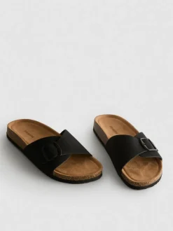 Sandalias destalonadas con tira con hebilla