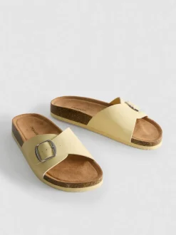 Sandalias destalonadas con tira con hebilla