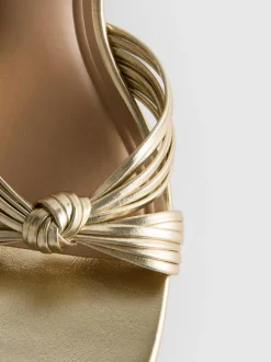 Sandalias de tacón con detalle retorcido