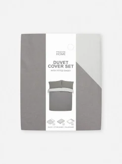 Set de cama reversible con sábana bajera