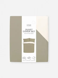 Set de cama reversible con sábana bajera