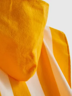 Toalla tipo poncho con capucha en algodón puro