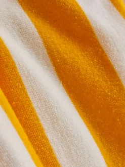 Toalla tipo poncho con capucha en algodón puro