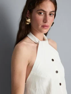 Top con cuello halter, botones y textura