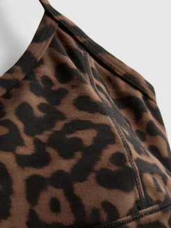 Top corto deportivo con espalda olímpica de leopardo