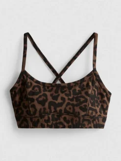 Top corto deportivo con espalda olímpica de leopardo