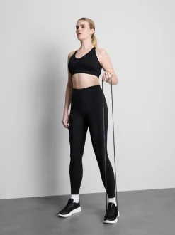 Top corto deportivo sin costuras con espalda cruzada