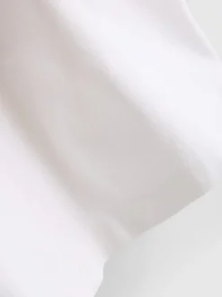 Top corto extrasuave con escote amplio