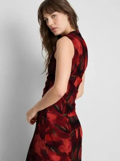 Top de malla floral sin mangas con escote alto