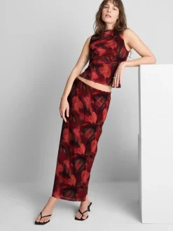 Top de malla floral sin mangas con escote alto
