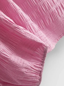 Top de manga larga con cuello barco fruncido