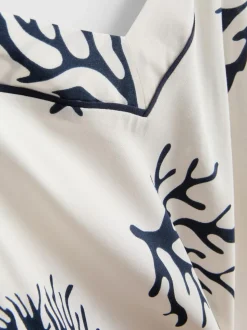 Top de pijama con tirantes y estampado de corales