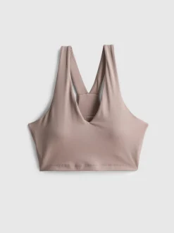 Top deportivo corto con cuello de pico