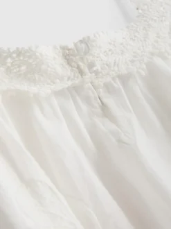 Top de tirantes de algodón con bordado floral