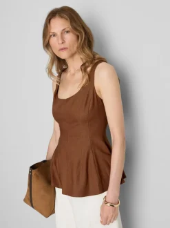 Top formal con péplum en mezcla de lino
