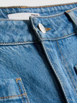 Vaqueros de pernera ancha con bolsillo delantero