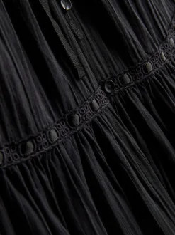 Vestido corto con volantes de Paula Echevarría