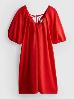 Vestido corto con vuelo y mangas abombadas