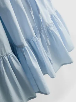 Vestido corto de popelina con tirantes y volante