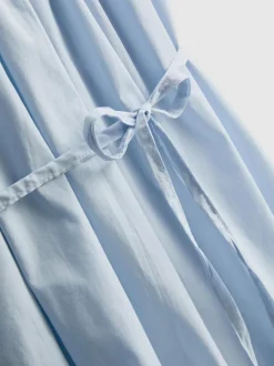 Vestido corto de popelina con tirantes y volante
