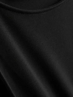 Vestido midi con bajo caído