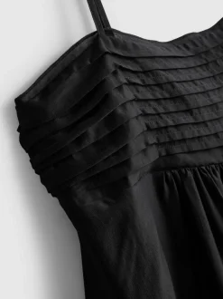 Vestido midi con bajo de corte pañuelo