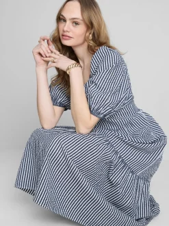 Vestido midi con volantes en sirsaca de algodón