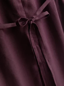 Vestido midi sin mangas de lino de The Edit