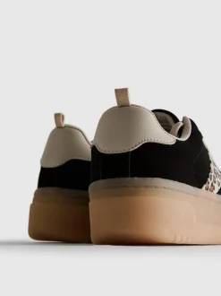 Zapatillas de leopardo con suela gruesa de goma