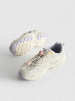 Zapatillas gruesas con detalles florales